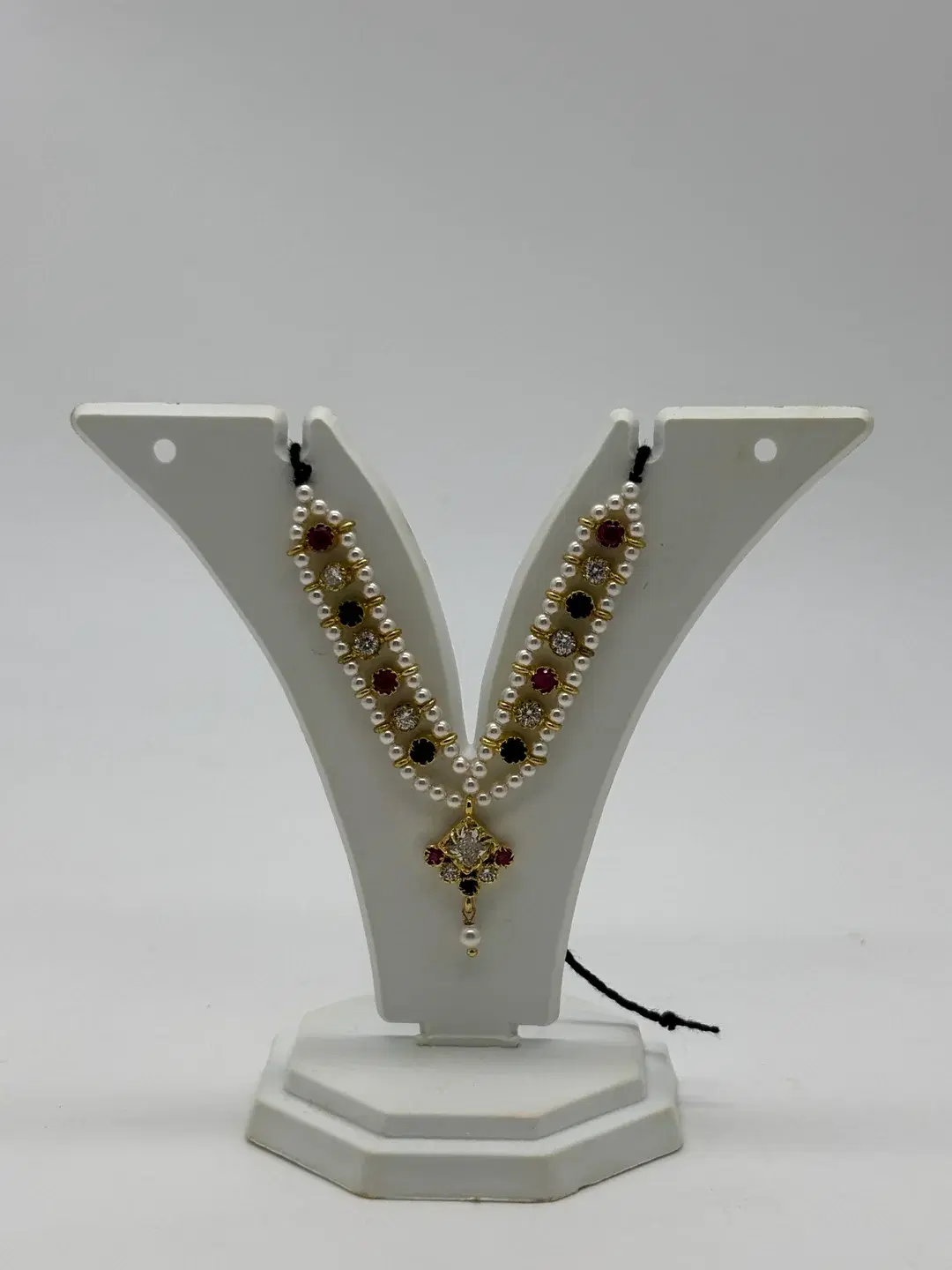 Double-strand pearl necklace with silver prong-set stones and central diamond AD pendant for Laddu Gopal