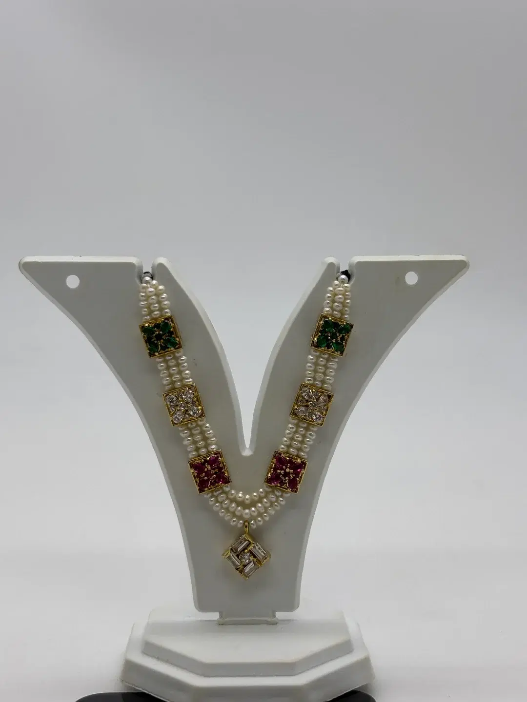 Royal freshwater pearl milma haar with six silver gem-set chowkis and baguette AD pendant for Laddu Gopal