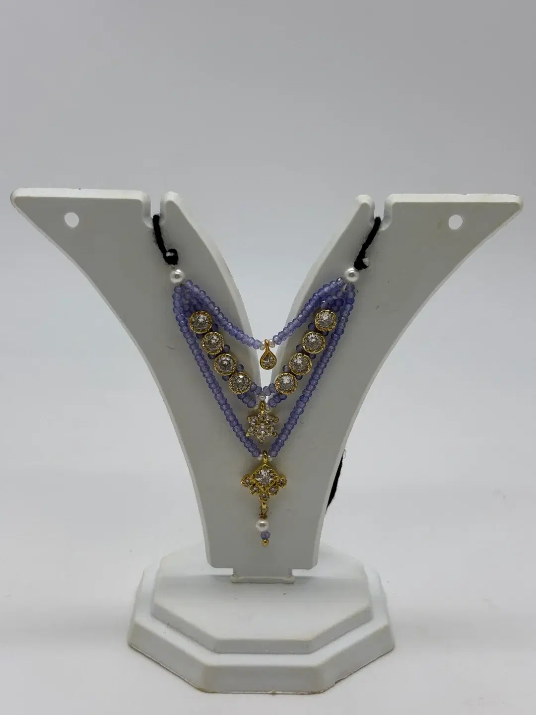Blue sapphire bead layered haar with silver-prong AD stones and central floral pendant for Laddu Gopal