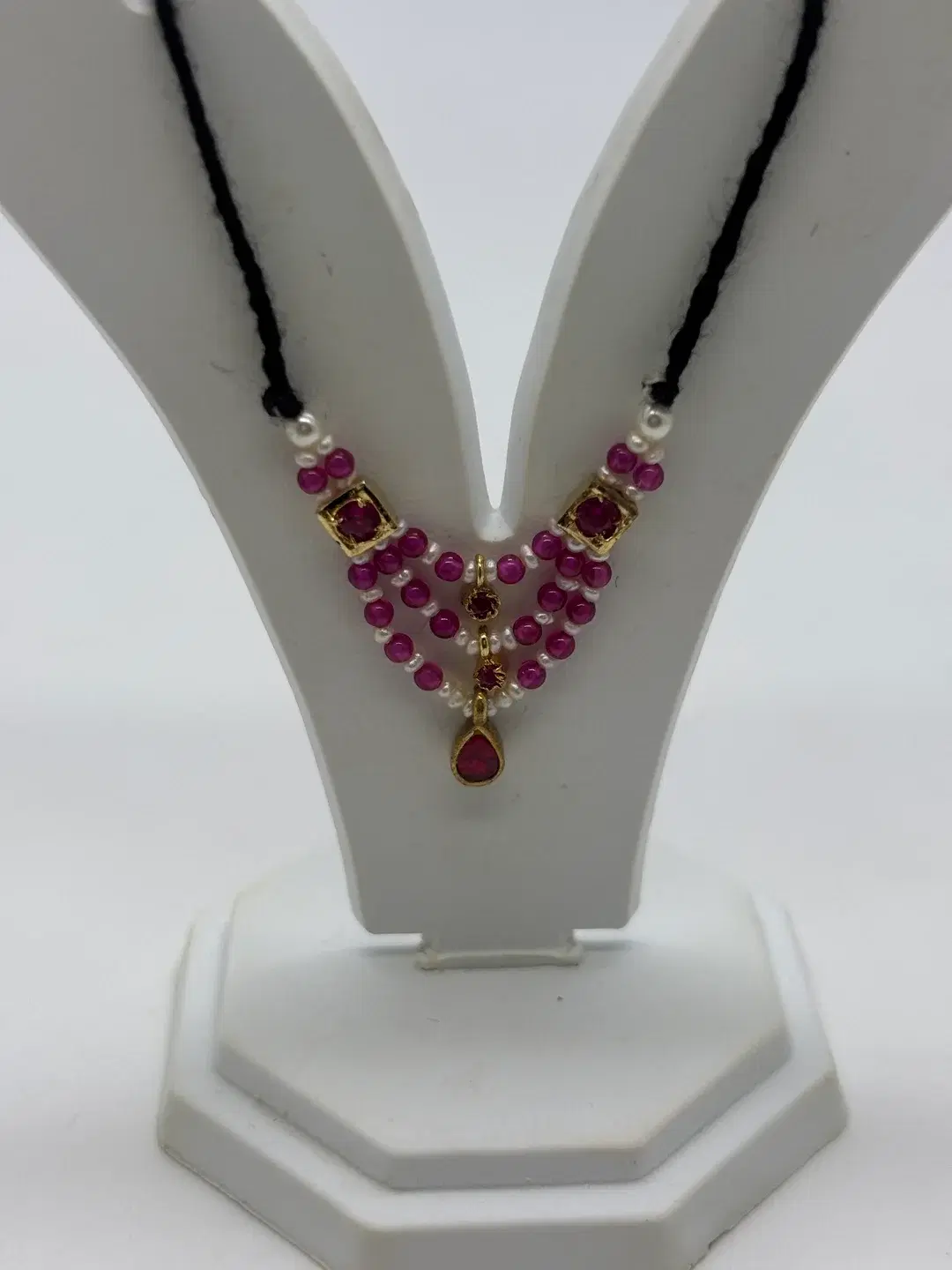 Three-tier ruby bead and seed pearl haar with silver chowkis and teardrop ruby pendant for size 1-2 Laddu Gopal