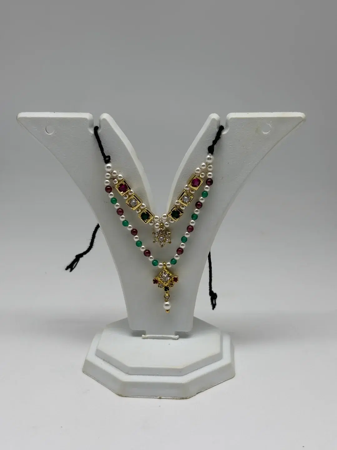 Double-tier milma pearl and gemstone haar with silver chowkis, star drop, and diamond AD pendant for Laddu Gopal