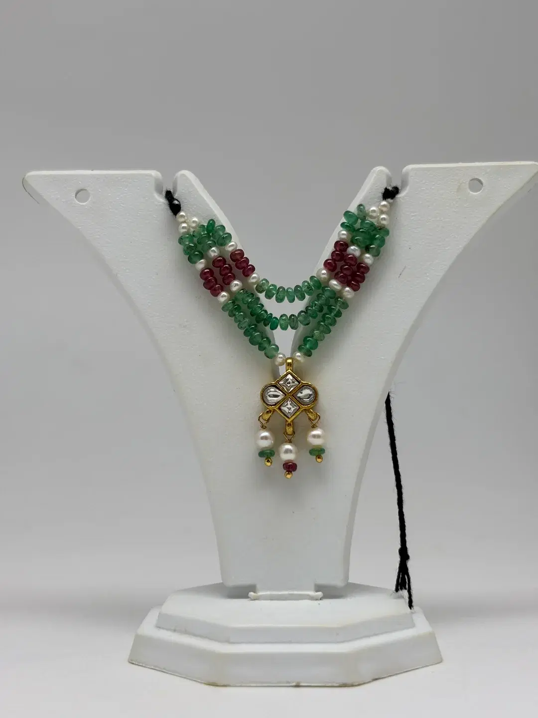 Three-strand ruby and emerald bead haar with silver kundan kalash pendant and pearl drops for Laddu Gopal