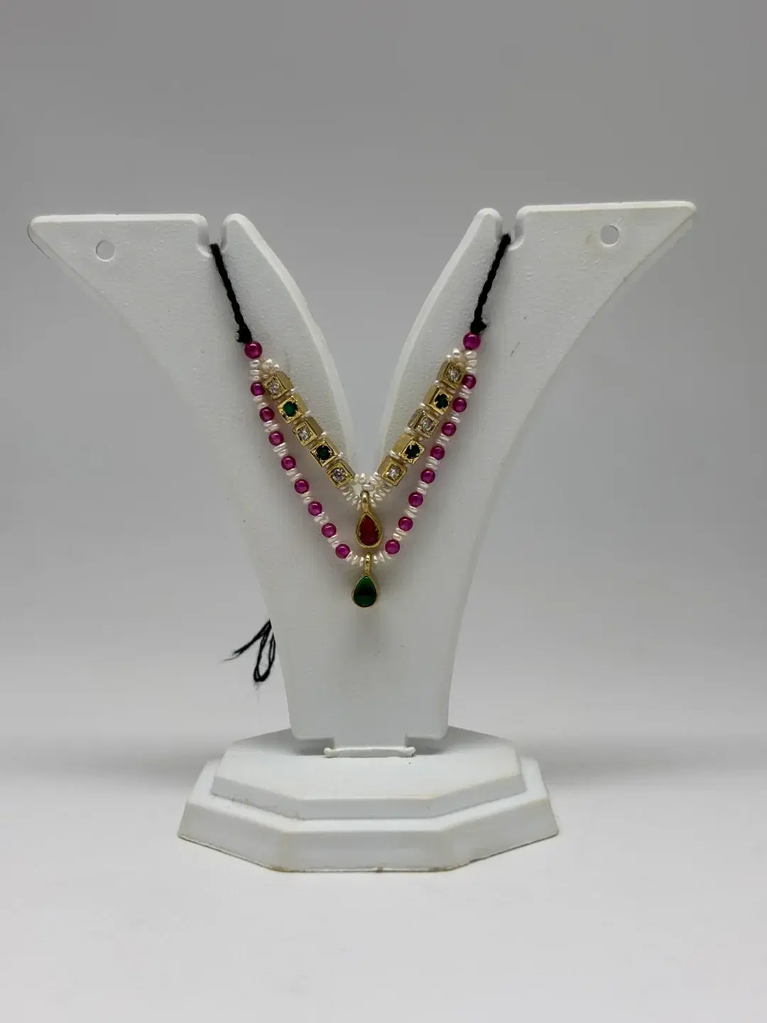 Double-strand ruby bead and pearl milma haar with silver AD chowkis and kundan drop pendant for Laddu Gopal